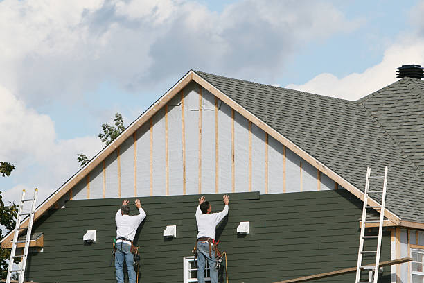 Professional Emergency Siding Repair technician working in White Cottage, OH
